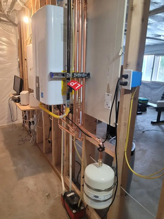 Licensed plumber repairing a kitchen sink in Westminster